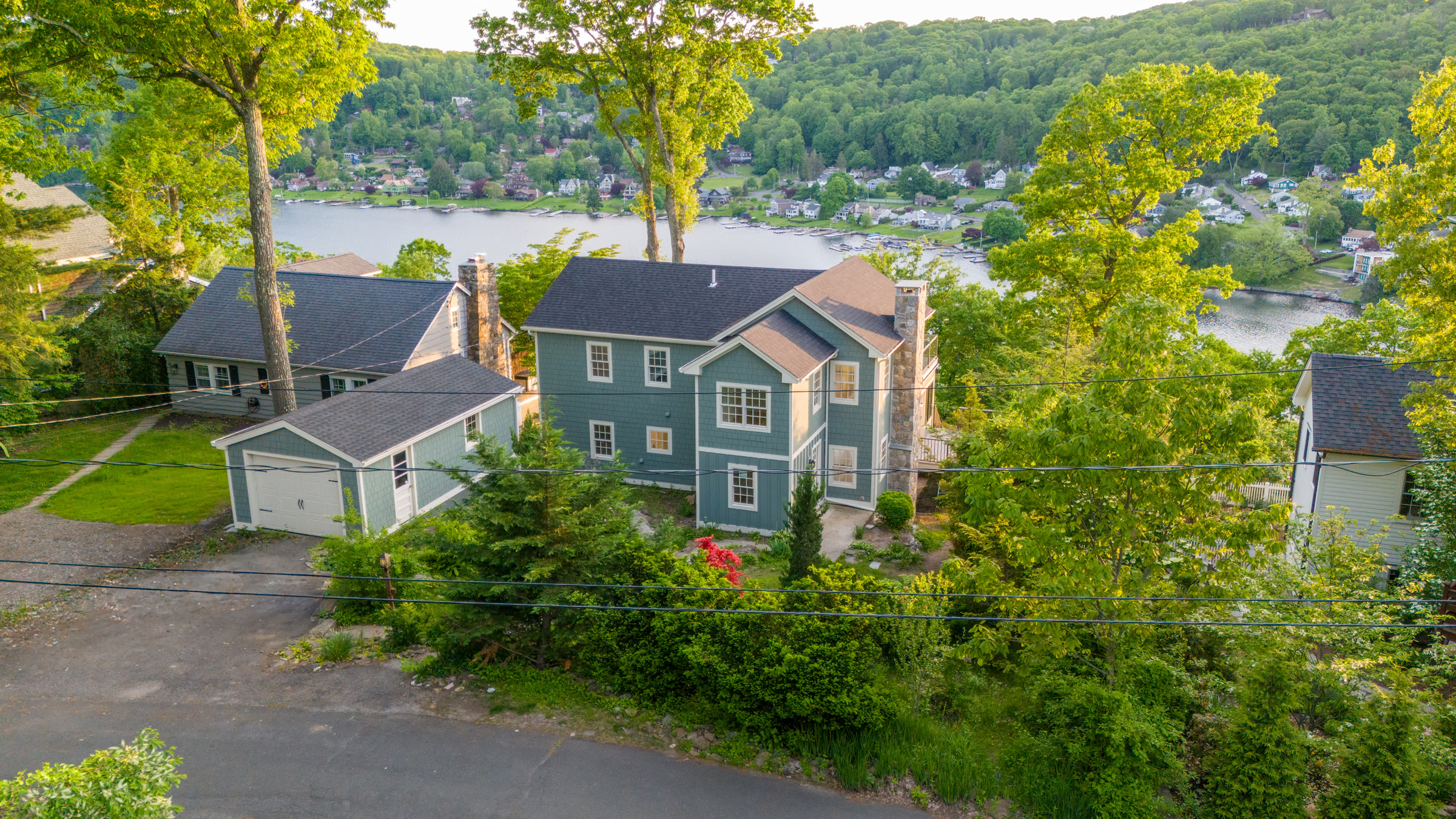Aerial drone view of the renovated home at 48 Ridge Road, Candlewood Isle